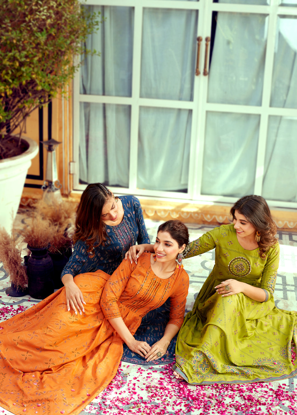 Women Wearing Anarkali Kurti Posing in front of Camera