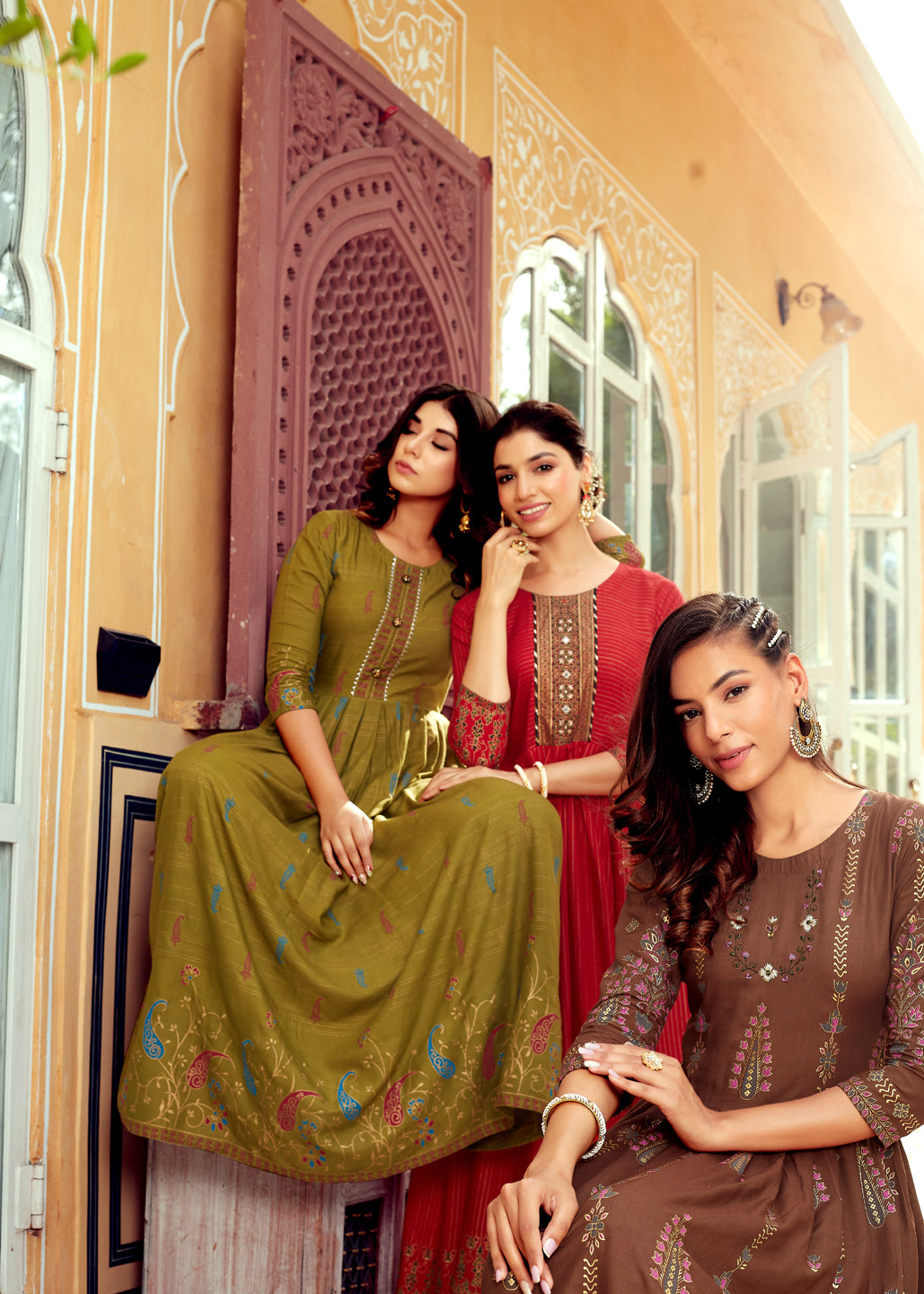 3 Women Wearing Green, Red & Brown Anarkali Kurta Set