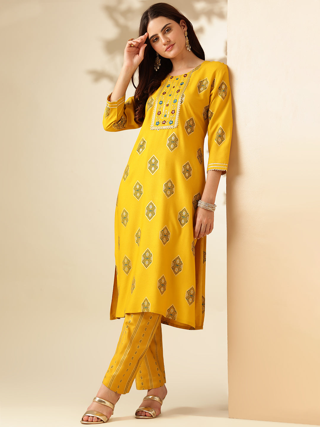 Embroidered Yellow Rayon Kurta Sets For Women