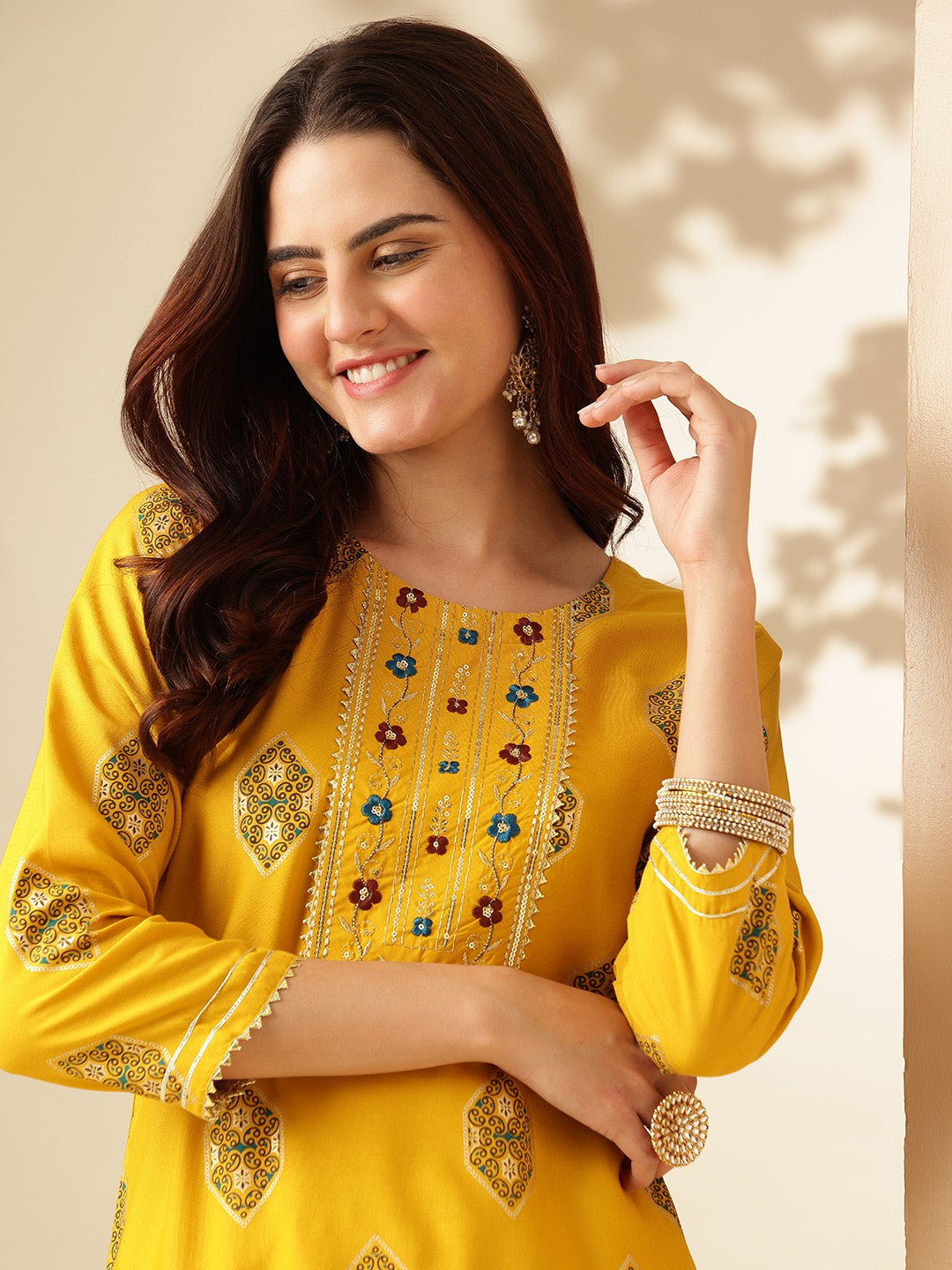 Embroidered Yellow Rayon Kurta Sets For Women