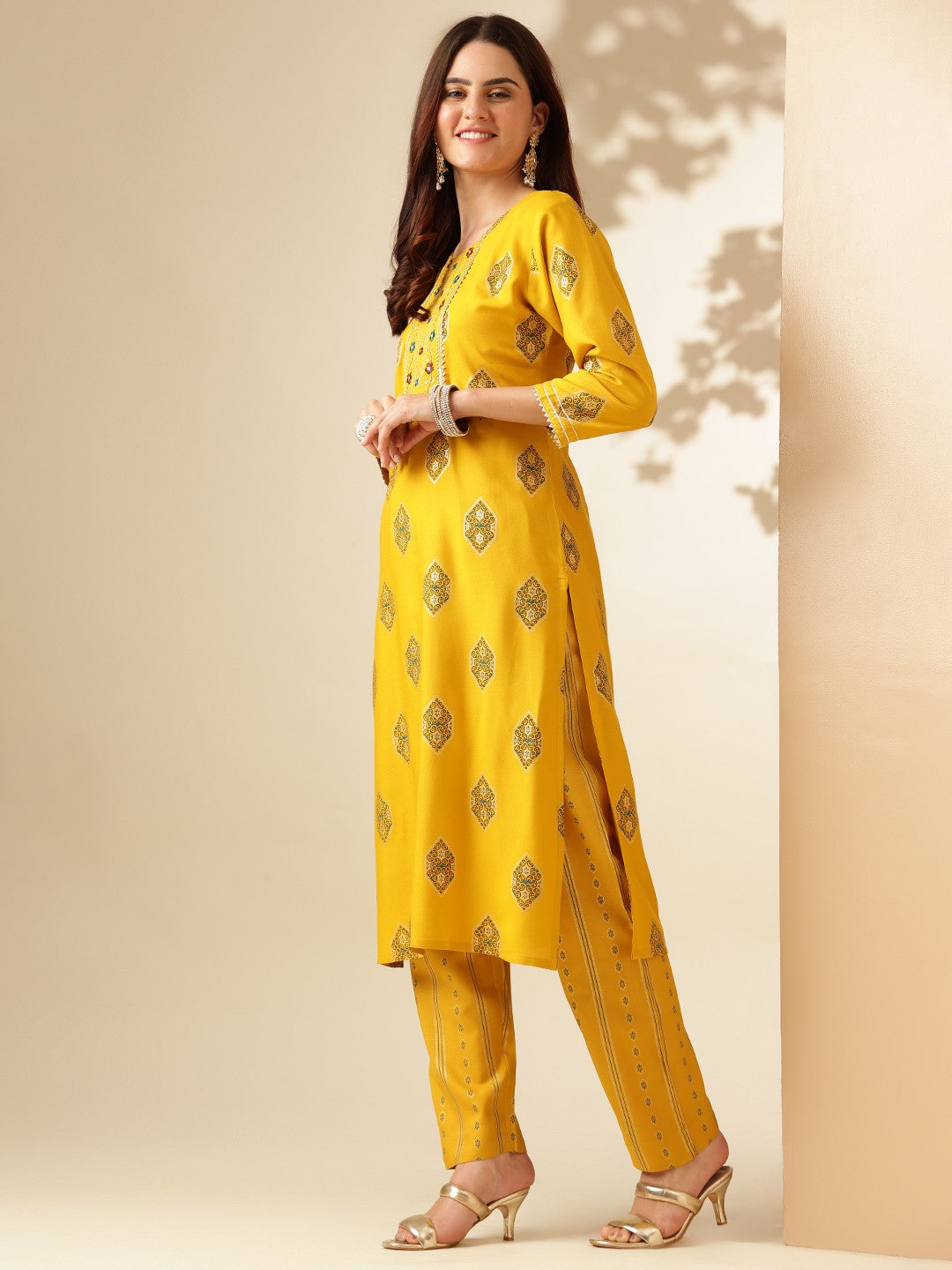 Embroidered Yellow Rayon Kurta Sets For Women