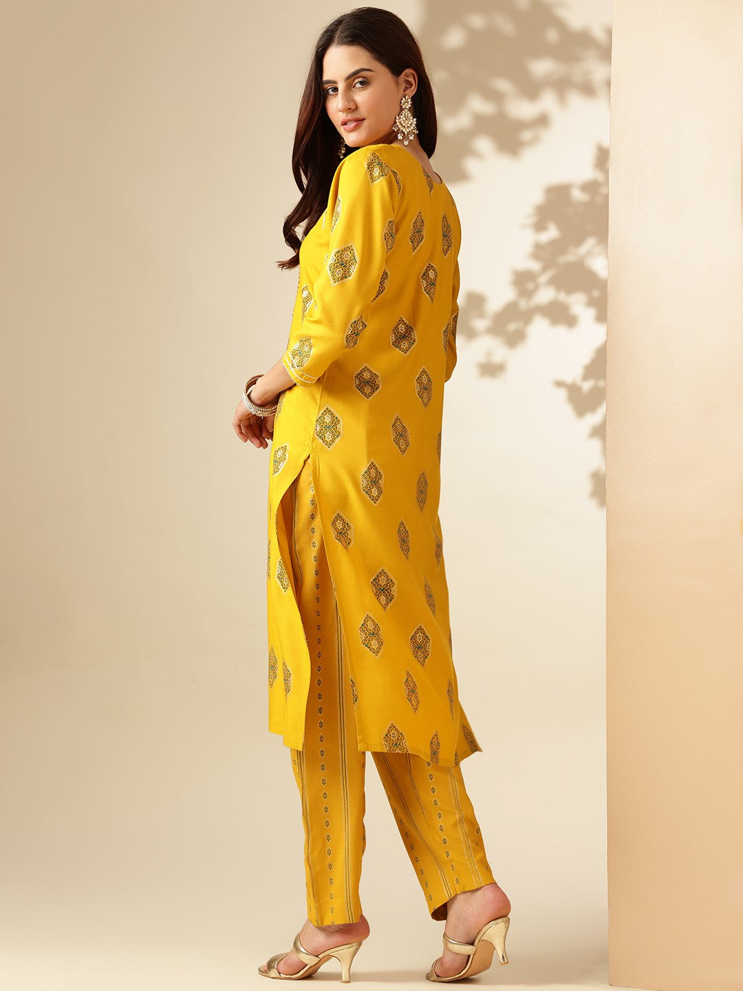 Embroidered Yellow Rayon Kurta Sets For Women