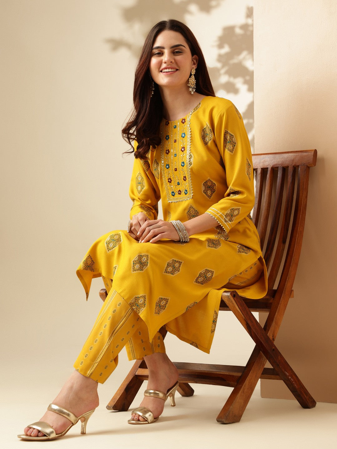 Embroidered Yellow Rayon Kurta Sets For Women