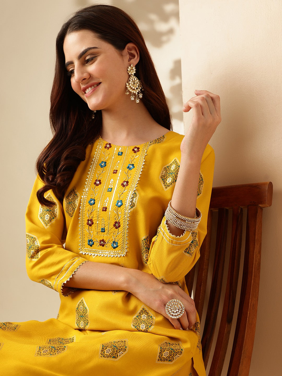 Embroidered Yellow Rayon Kurta Sets For Women