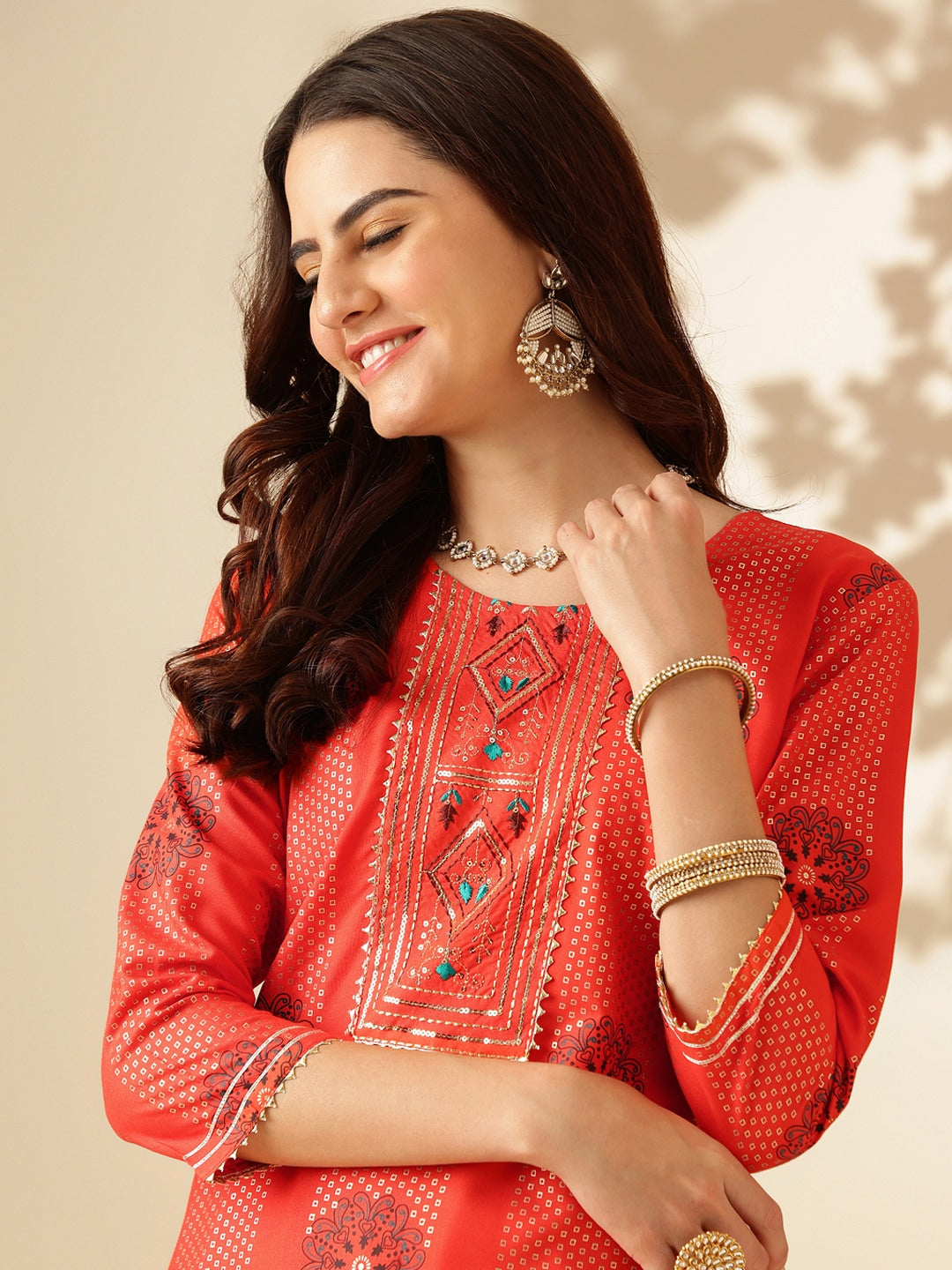 Embroidered Orange Rayon Kurta Sets For Women